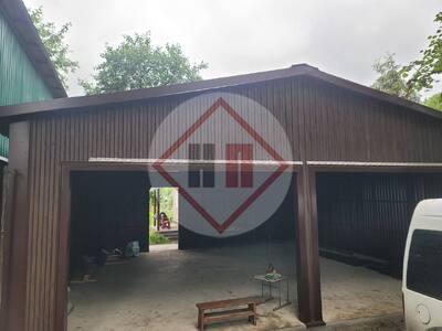 гараж из сэндвич-панелей с двускатной крышей