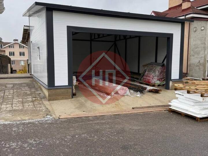 широкий односкатный гараж из сэндвич-панелей