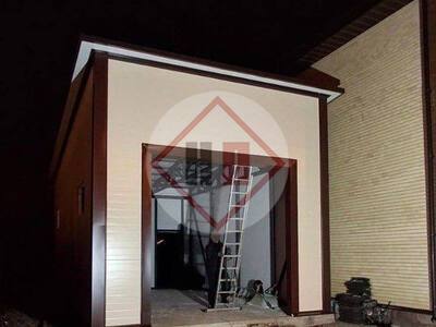 односкатный гараж с крышей и стенами из сэндвич-панелей